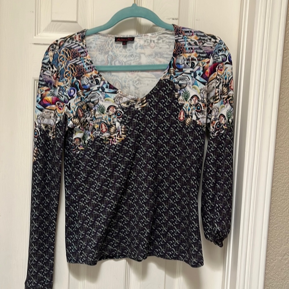 Long sleeve v neck soft t shirt material.